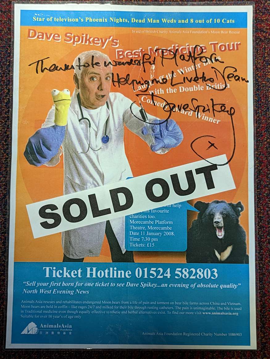 Signed poster by Dave Spikey