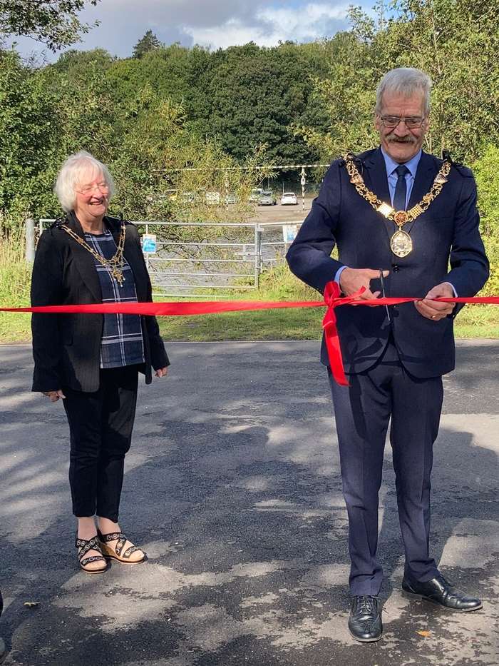 Councillor Mike Greenall, Mayor of Lancaster, officially opens the new flood wall