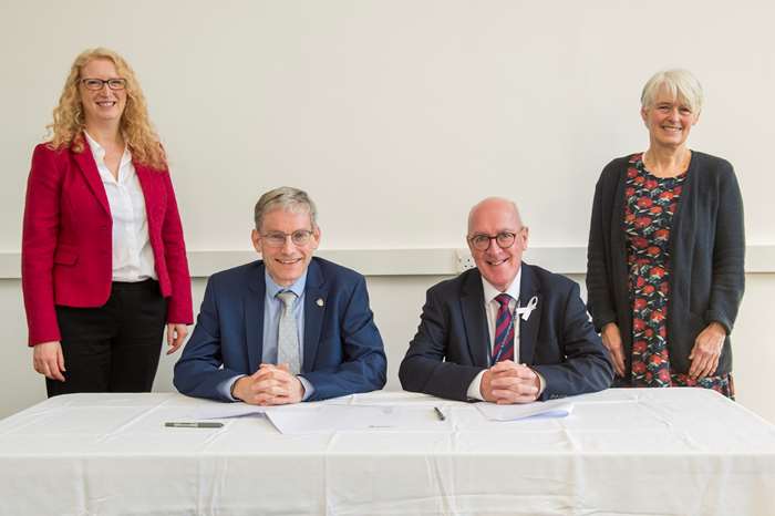 Vice-Chancellor of Lancaster University Professor Andy Schofield (seated left) and Chief Executive of Lancaster City Council Kieran Keane sign the Memorandum of Understanding at a ceremony this week.