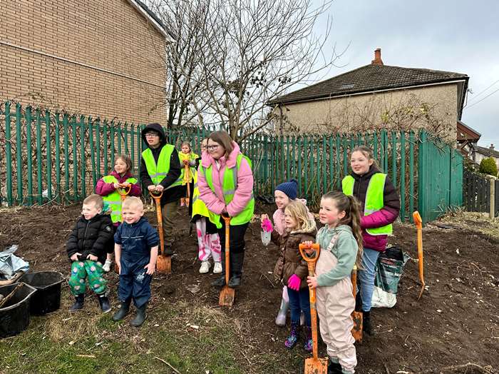 Children from Ryelands helped plant fruit trees on the estate.